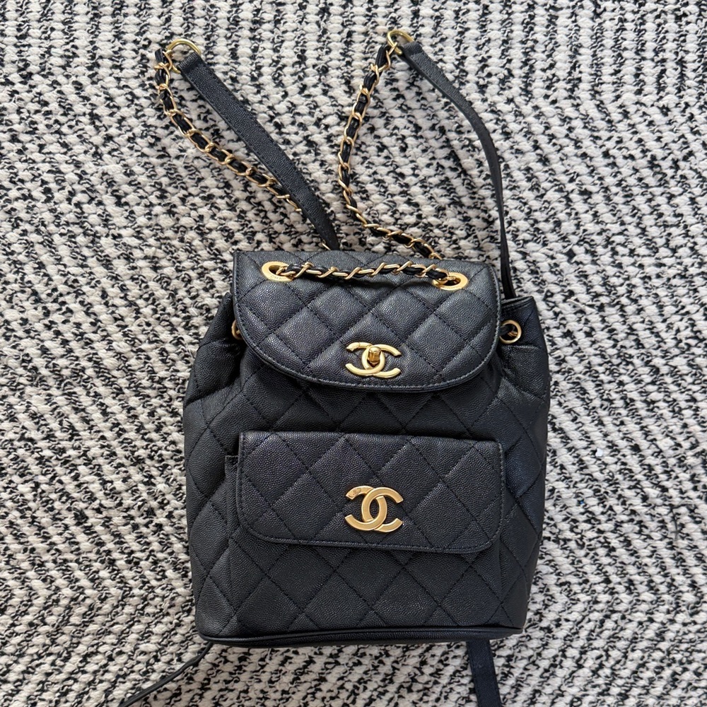 Quilted Black Backpack with Gold Accents